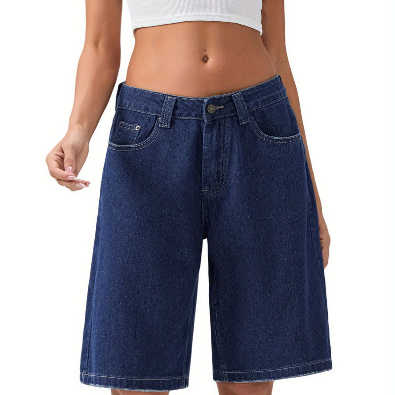 Light blue women's denim knee-length shorts with classic five-pocket styling