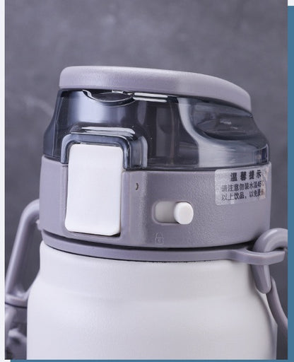 Insulated steel water flask by BACKUPMYFILESNOW® with large volume, silver finish, and secure lid for hot and cold beverages.