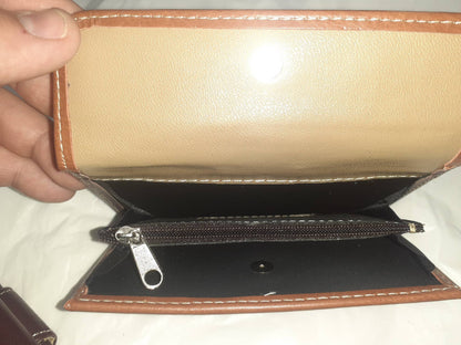 Handmade women's wallet with multiple card slots and a sleek design, crafted from high-quality materials.