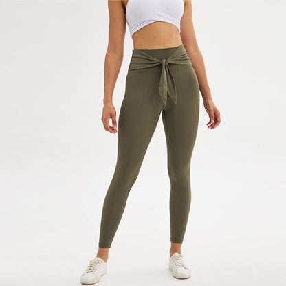 Nine-point yoga leggings with ankle straps, front view