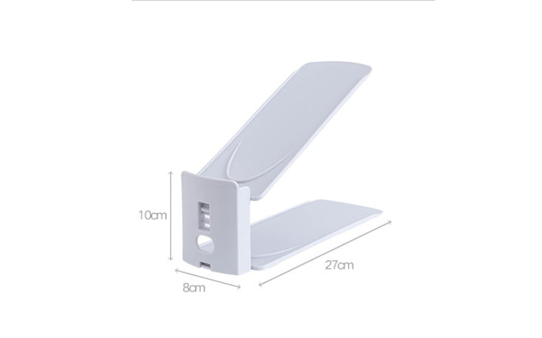 Shoe storage rack with multiple shelves, compact design for organizing footwear