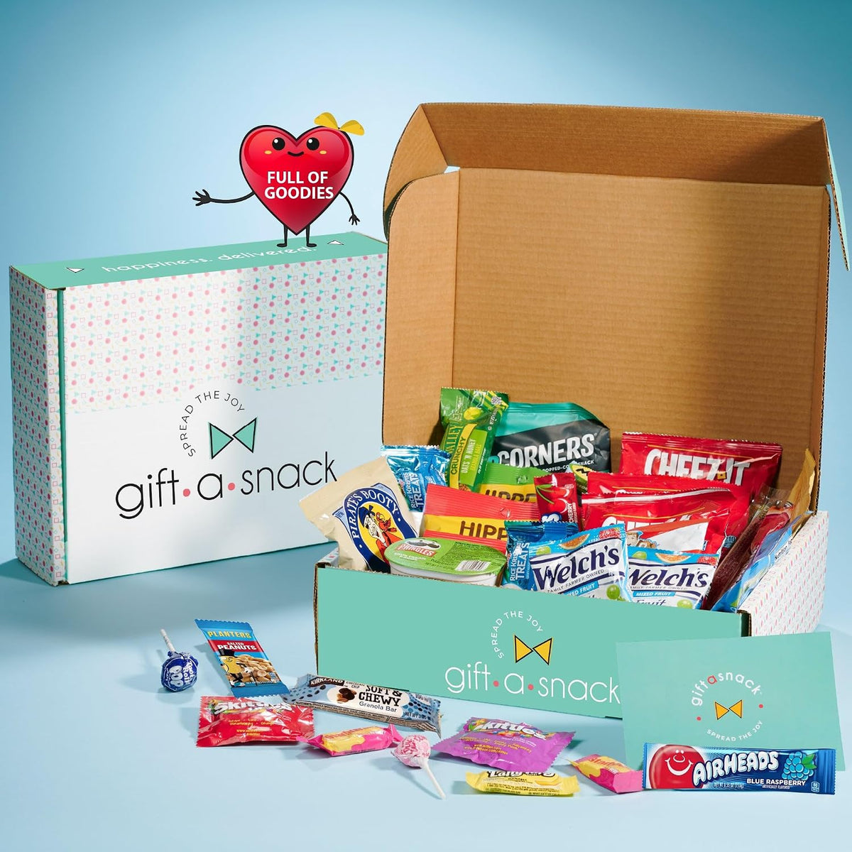 Nut Cravings gift box with healthy snack variety pack and 60-count greeting card, featuring assorted nutritious snacks in a colorful box.