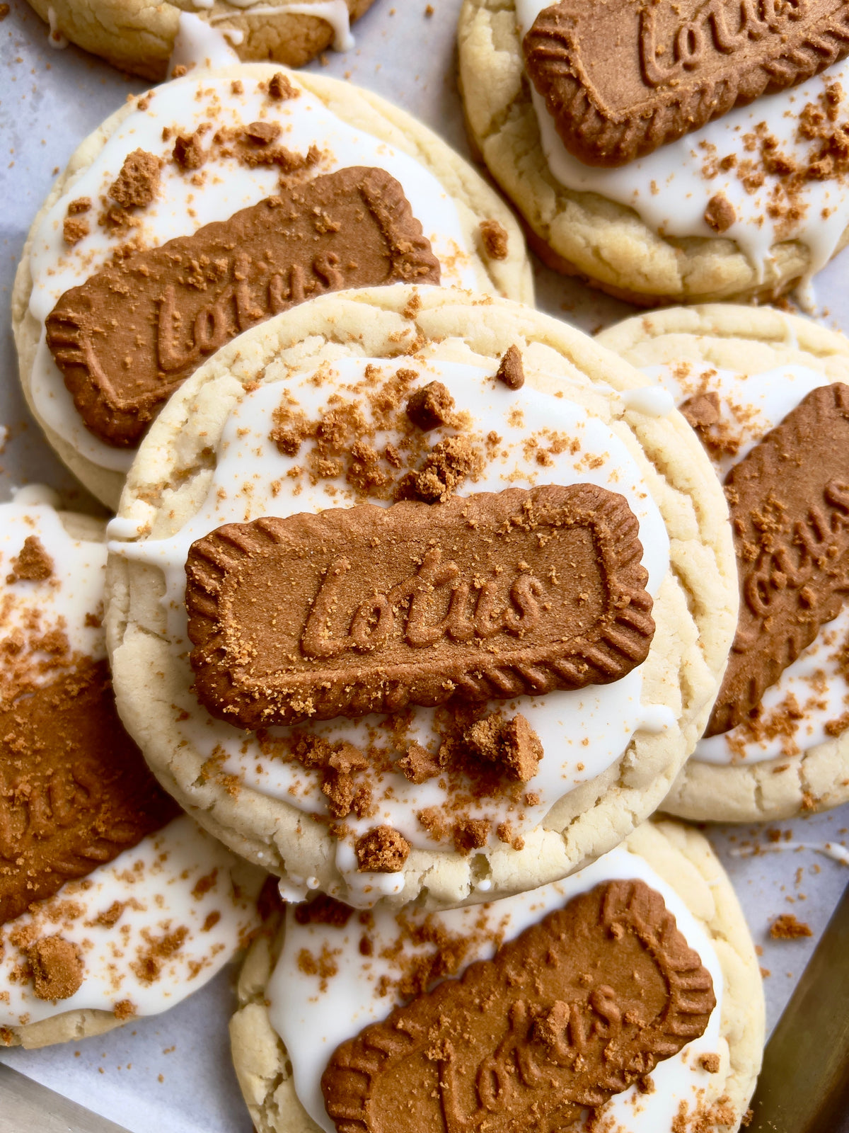 Creamy white chocolate cookie butter jar from Let's Get Baked Artisan Desserts, showcasing smooth, rich spread with cookie and chocolate flavors.