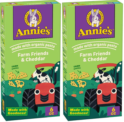 Annie's Homegrown organic mac and cheese pack with four shells and white cheddar cheese, 24 oz, in a bright package.