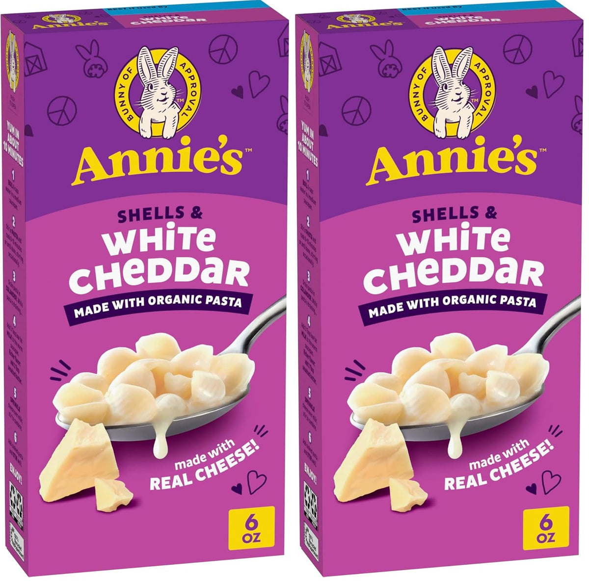 Annie's Homegrown organic shells and white cheddar mac and cheese pack with four 24-ounce boxes on a white background.