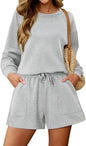 KISSMODA women's lounge set with matching sweatpants and cropped top, comfortable casual wear for relaxing or lounging at home.