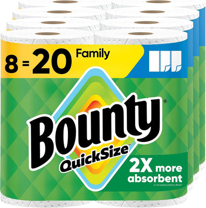 Bounty paper towels Quick Size in white, 16 family rolls, shown in a kitchen setting with towels partially unrolled.