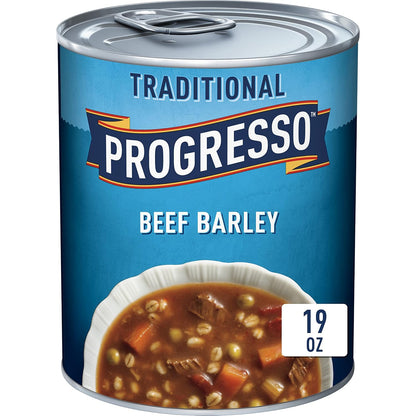 Cans of Progresso Traditional Chicken Noodle Soup, 19 oz, 4-pack, featuring labeled cans with soup images and branding.