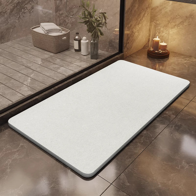 Water-absorbent non-slip quick-drying entryway doormat in a textured design