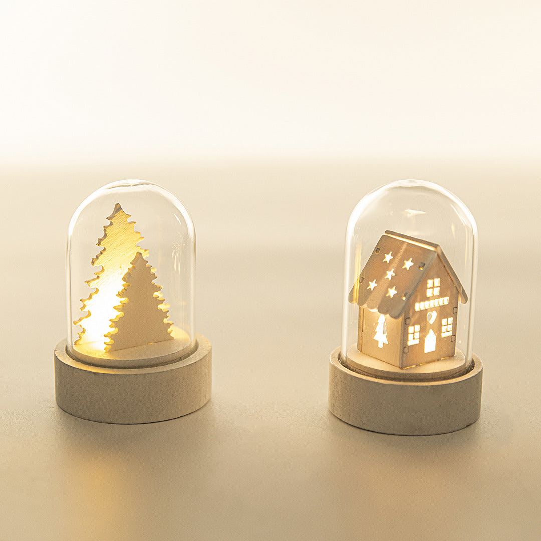 Luminous wooden Christmas house ornament with festive decorations, glowing holiday home design