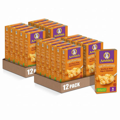 Annie's Shells & White Cheddar organic mac and cheese pack with 4 cups in a 24 oz box, featuring pasta shells and cheese sauce