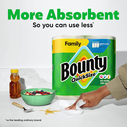 White Bounty Paper Towels in quick size, 16 family rolls, displayed on a kitchen counter with a roll partially unrolled