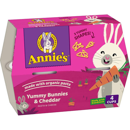 Annie's White Cheddar Mac and Cheese Microwavable Cups, 8-pack, showing the individual cheese cup with white cheddar flavor.