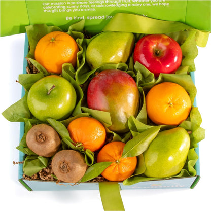 Fresh fruit gift basket by A Gift Inside with pears, apples, navel oranges, and tropical fruit for any occasion.
