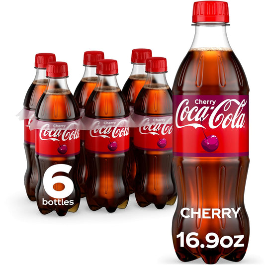 Six 16.9 fl oz Coca-Cola soda soft drink bottles in a six-pack, featuring classic Coca-Cola branding and clear plastic bottles.