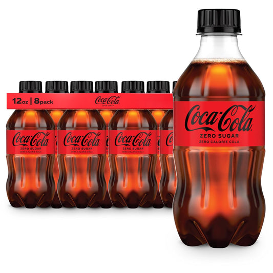 Coca-Cola Zero Sugar soft drink cans in a 12-pack, 12 fl oz each, inside a fridge pack, showcasing the Coca-Cola Zero branding.