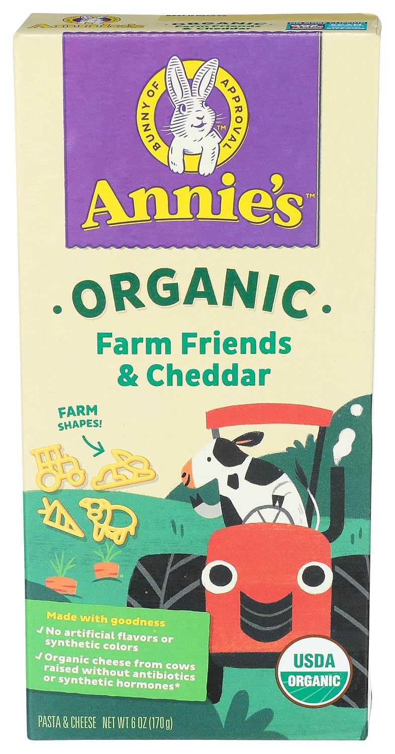 Annie's Shells & White Cheddar organic packaged mac and cheese box with pasta shells and creamy cheese flavor.