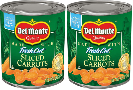Cans of Del Monte sliced carrots in a pack of 12, showing the prepackaged orange carrots inside the labeled cans.