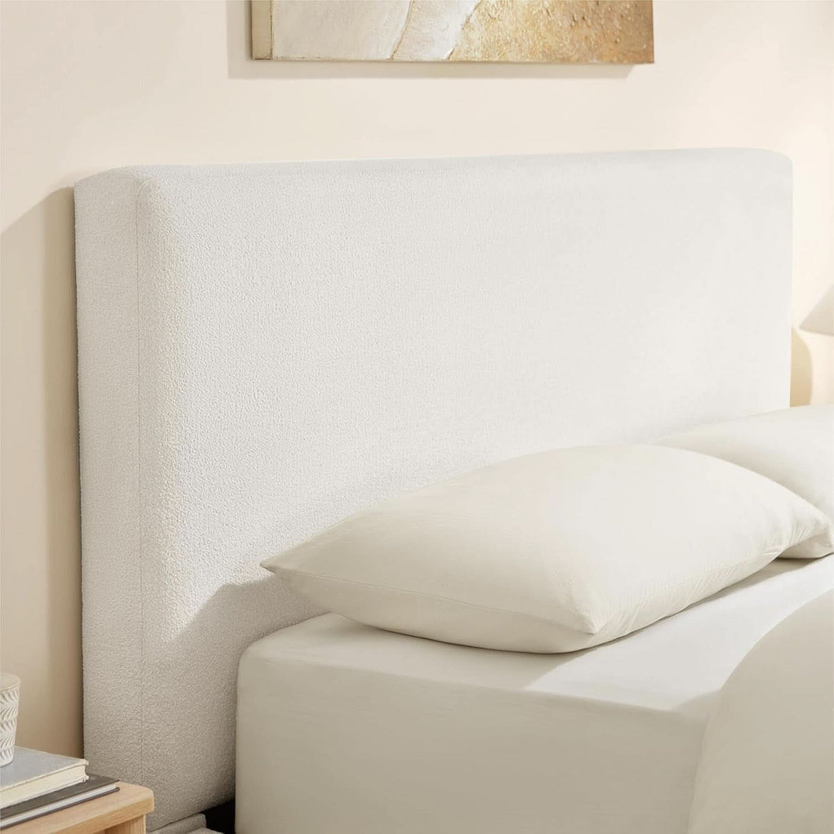 Queen size luxurious upholstered platform bed frame with padded headboard and sturdy wooden legs, in a modern design.