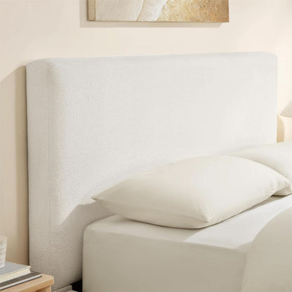 Queen size luxurious upholstered platform bed frame with padded headboard and sturdy wooden legs, in a modern design.