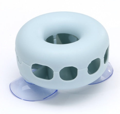 Suction wall toothbrush holder in white, designed for bathroom organization