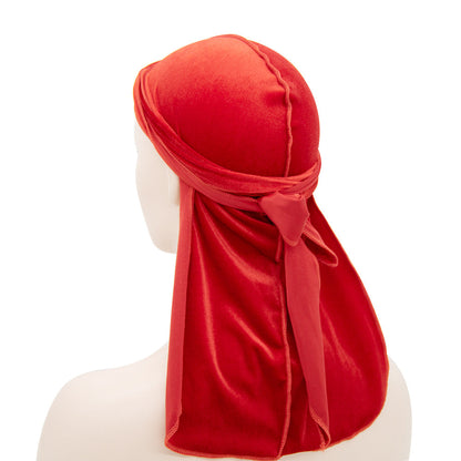 Velvet long tail pirate hat with a tall crown and flowing pointed tail, shown in detail