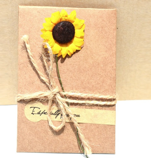 Creative kraft dried flower greeting card with natural botanical design