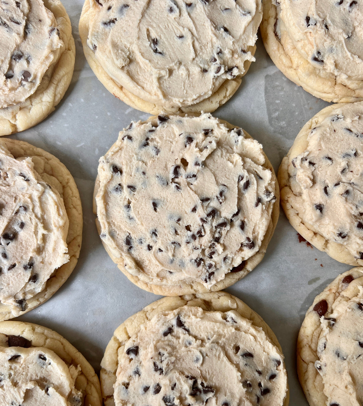 Chocolate chip cookie dough cookies from Let's Get Baked Artisan Desserts, featuring golden-brown cookies with chocolate chips.