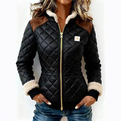 Women's quilted jacket with fur trim and zipper closure, front view