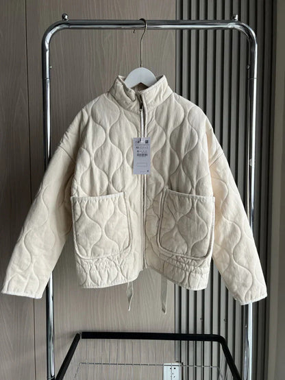 Women's diamond-quilted cotton jacket in a new arrival style, shown in detail.