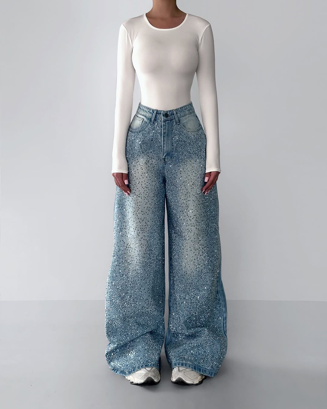 Irregular rhinestone jeans from Anybestbuy Store showing distressed denim with scattered rhinestone embellishments and a casual fit.