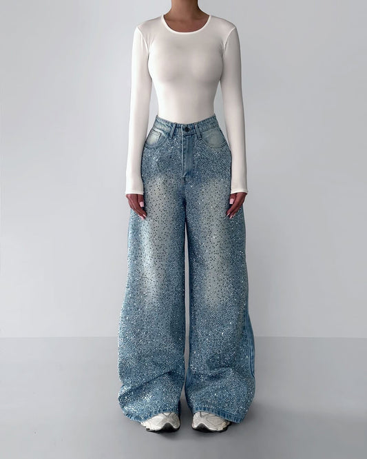 Irregular rhinestone jeans from Anybestbuy Store showing distressed denim with scattered rhinestone embellishments and a casual fit.
