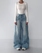 Irregular rhinestone jeans from Anybestbuy Store showing distressed denim with scattered rhinestone embellishments and a casual fit.