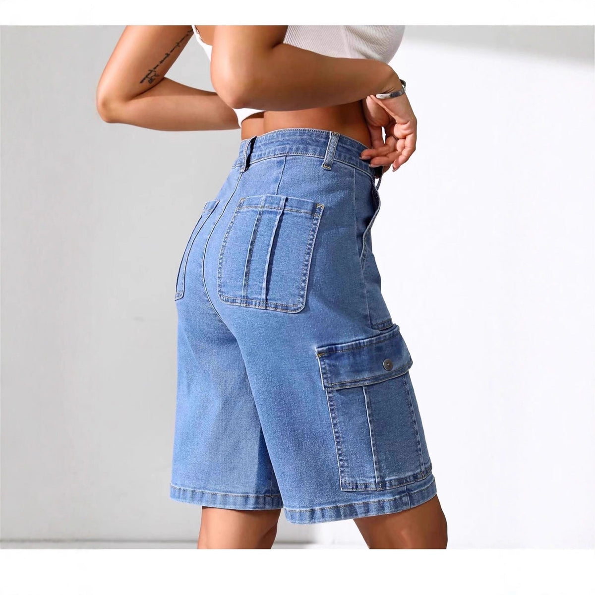 High-waisted denim capri shorts for women in classic blue