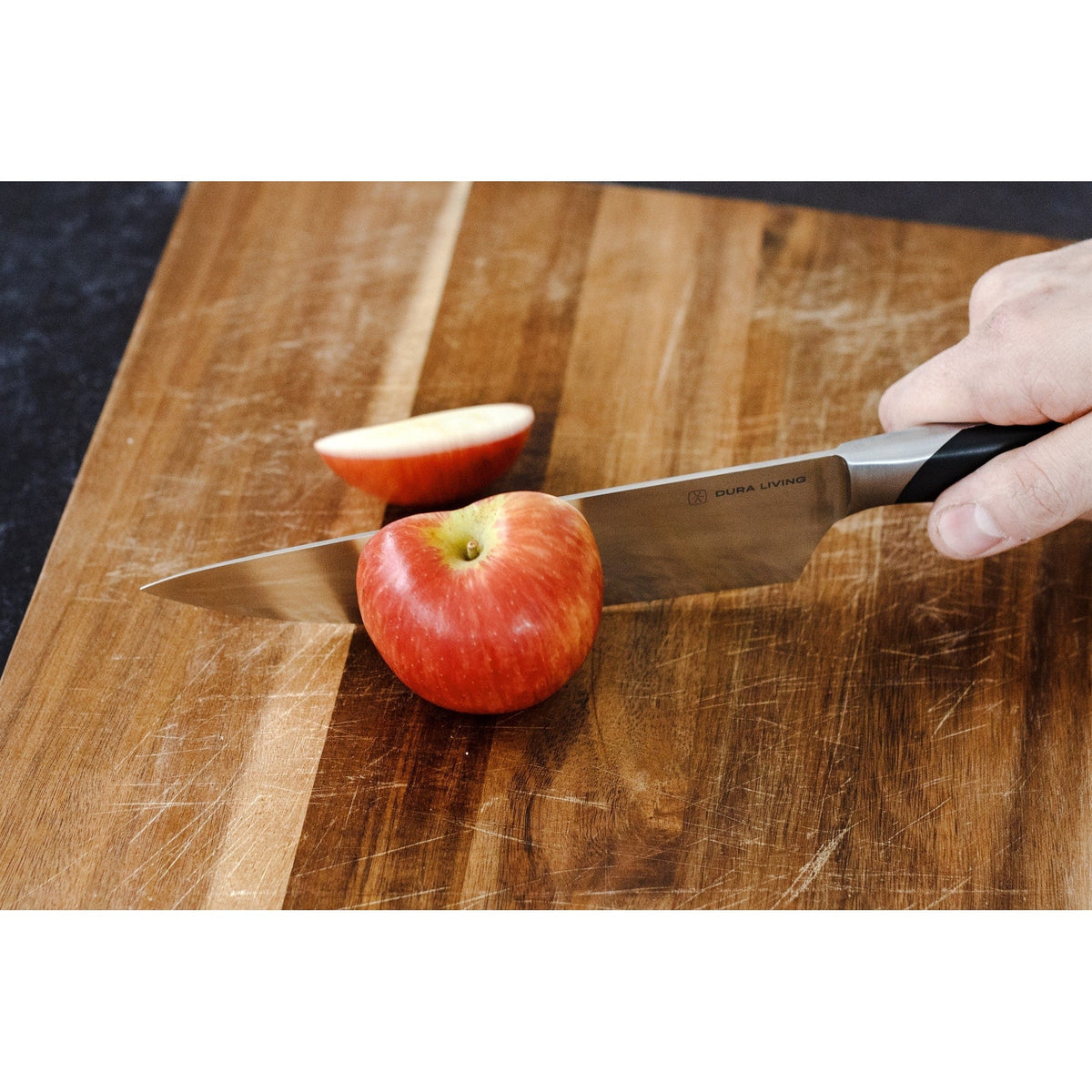 Dura Living Elite 8-inch black chef knife with a sleek handle and sharp stainless steel blade for precise cutting.