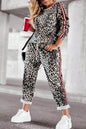 Plus size leopard print round neck top and pants set for women, stylish and comfortable fashion by Trendsi.