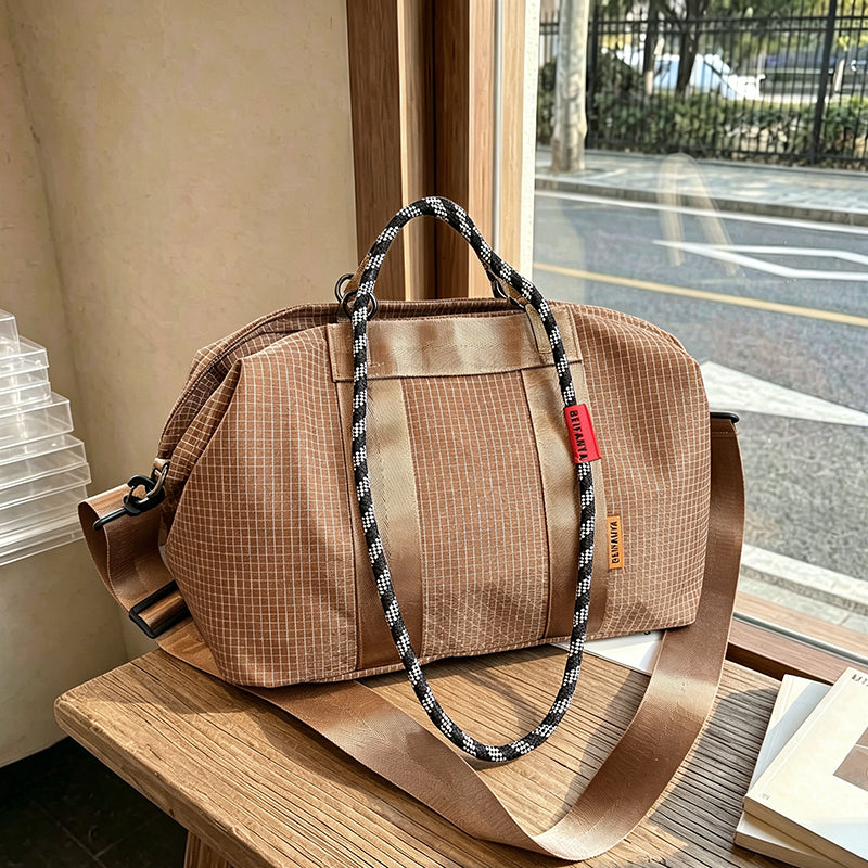 Grid pattern large capacity tote bag in a structured design with sturdy handlesWinvalid