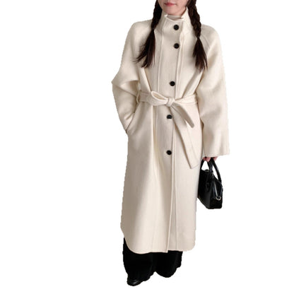 Women's long wool coat with single-breasted design, front view in a classic silhouette