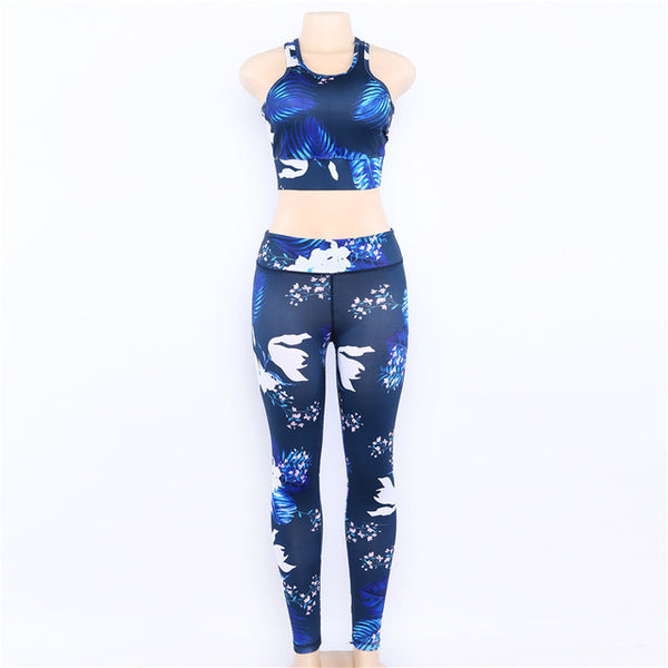 Women's floral print yoga set with supportive bra and matching leggings, stylish athletic outfit for active wear.