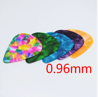 Folk Bakelite ukulele guitar pick in vintage style close-up