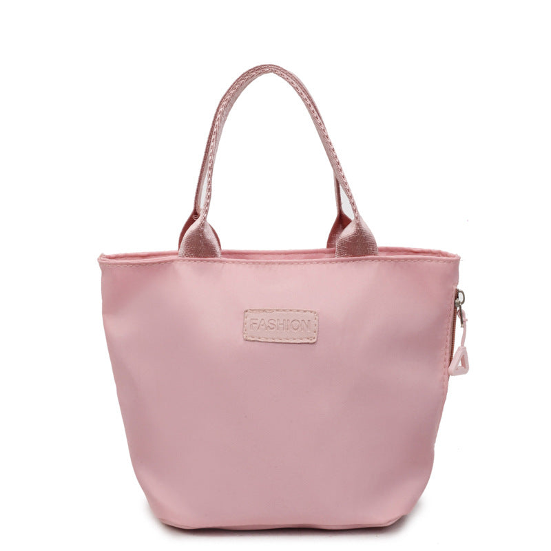 Fashionable women's casual fabric tote handbag with versatile commuter design in a spacious silhouette