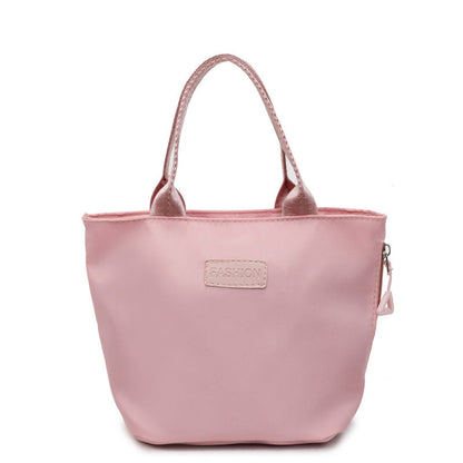 Fashionable women's casual fabric tote handbag with versatile commuter design in a spacious silhouette