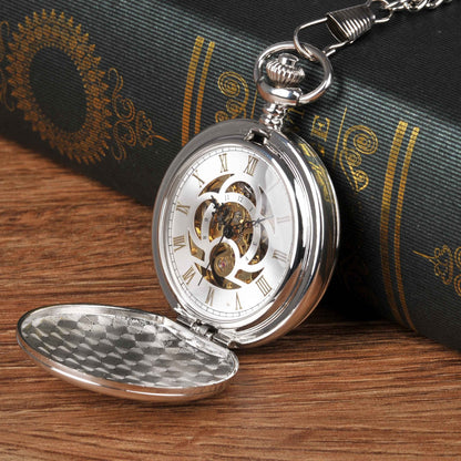 Large silver mechanical pocket watch with double-hinged case and visible pocket watch design