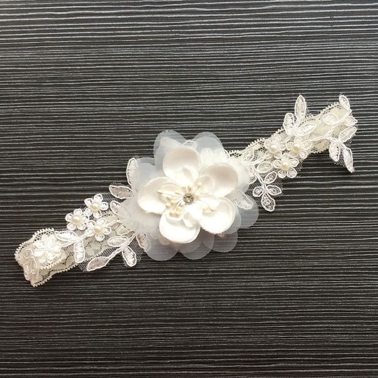 Western-style wedding garter elastic leg ring in white lace with decorative detailing