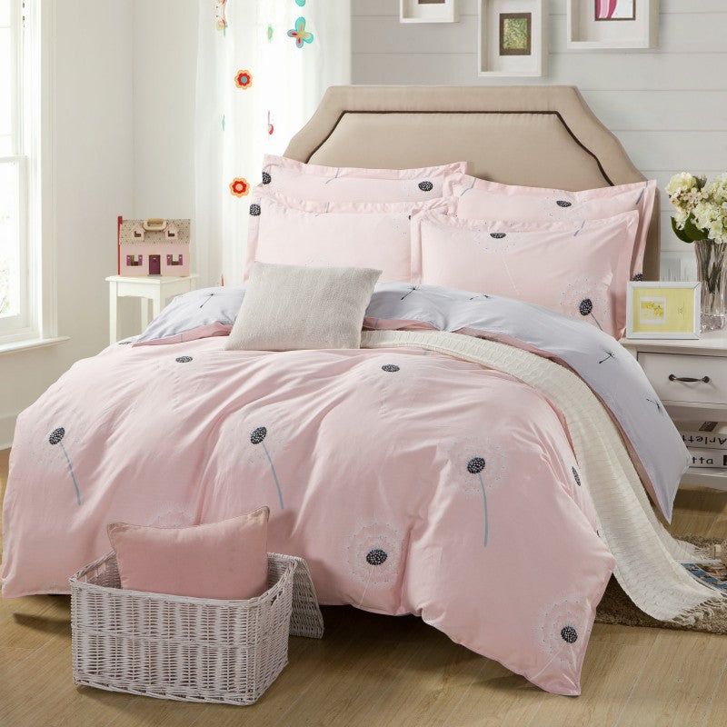 Four-piece Home Textiles cotton bedding set in soft, coordinated colors viewed from above