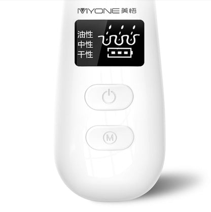 Electric blackhead remover in black, handheld skincare extraction device by My Store