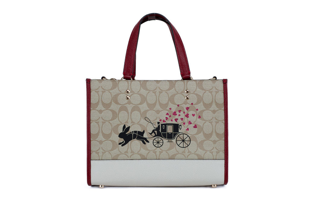 Coach Dempsey Medium Lunar New Year Rabbit Carryall Tote by BACKUPMYFILESNOW® with detailed rabbit embroidery and structured leather handles.