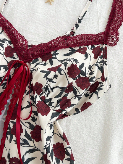 Lace-trimmed camisole with floral bow detail in a fashionable, versatile design