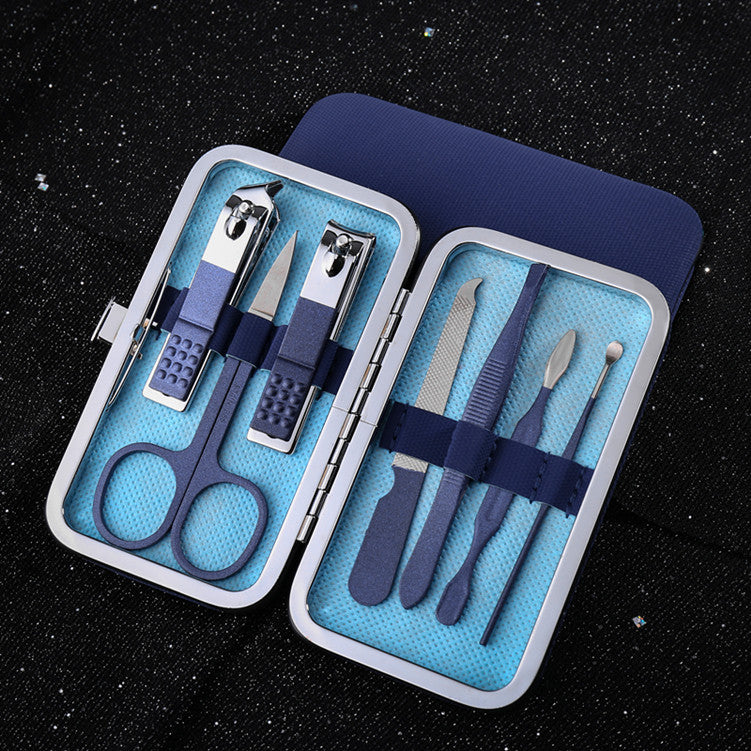 Manicure and pedicure nail care tool set with scissors and grooming accessories