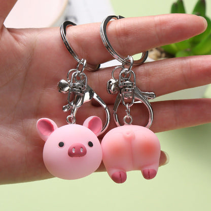 Cute creative key ring doll ornament, colorful miniature character accessory displayed on a light background